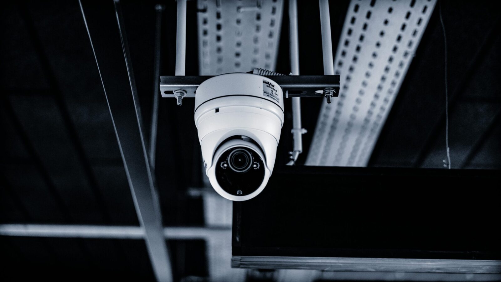 Ceiling-mounted security camera inside a building