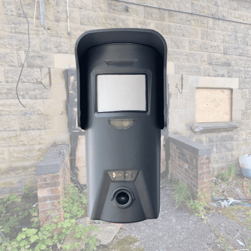 Security camera mounted on a brick wall